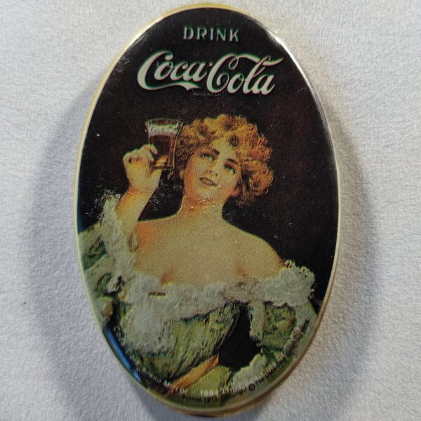 Coca Cola (ovale - femme présentant un verre)