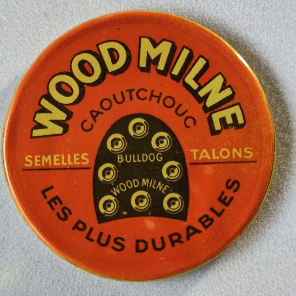 "Wood Milne, caoutchouc, semelles, talons, les plus durables". (Double).