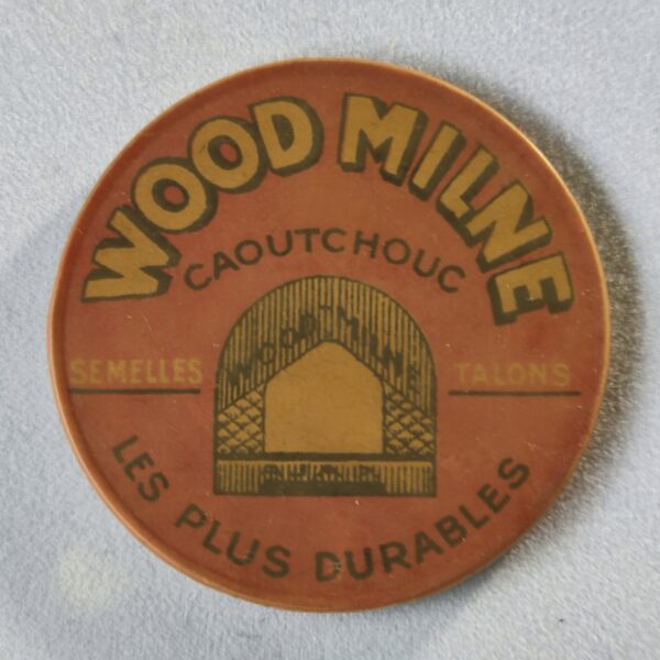 "Wood Milne, caoutchouc, semelles, talons, les plus durables". (Double).