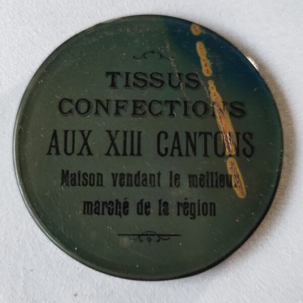 "Tissus Confections Aux XIII Cantons".