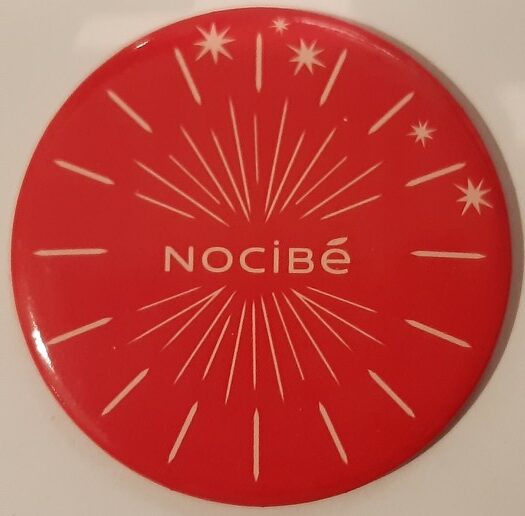 Nocibé (rond rose rayonnant)